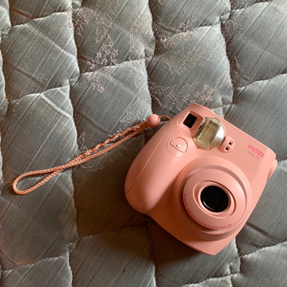 pink instax mini 75 polaroid camera with pink leather case